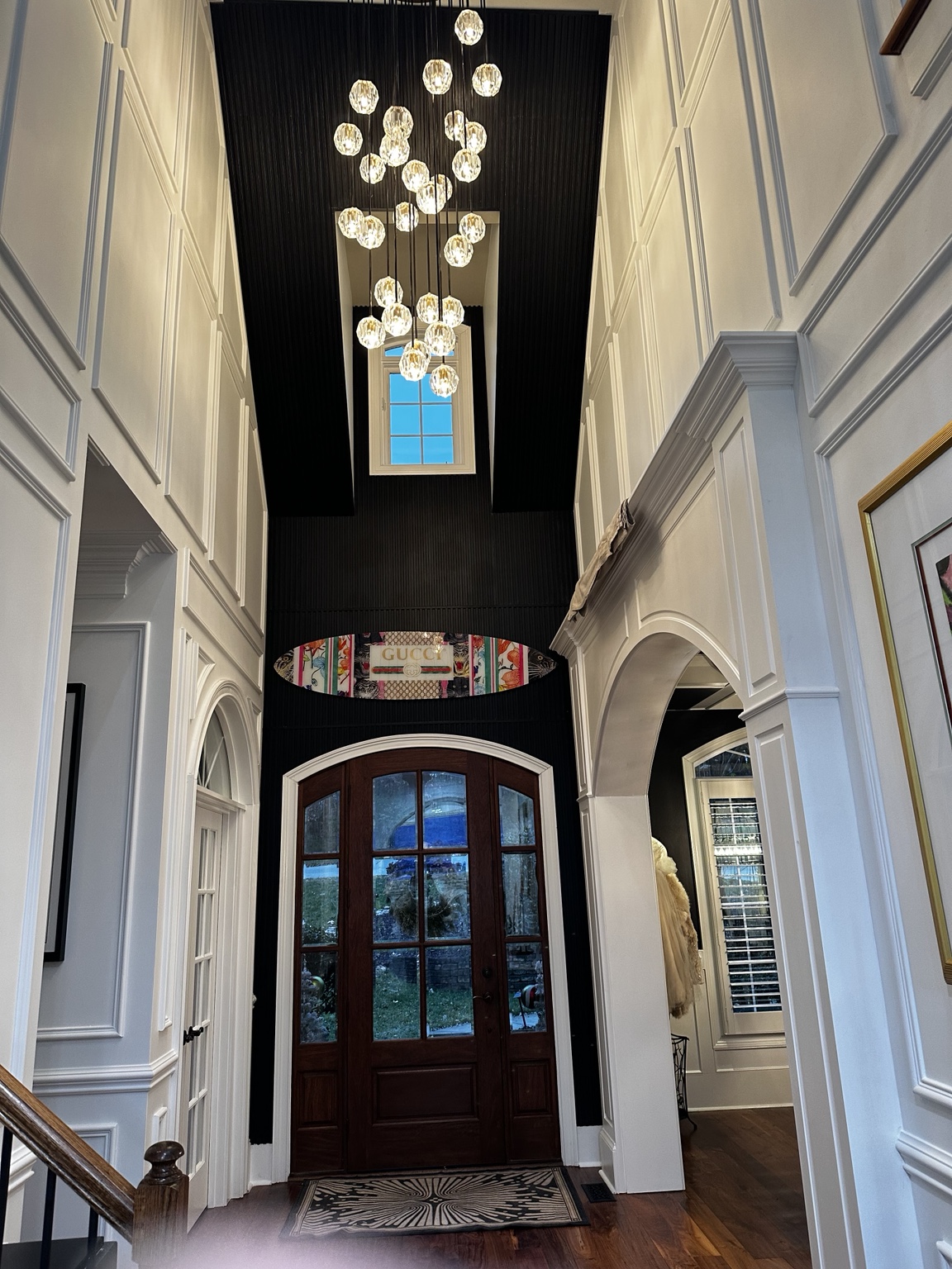 The same foyer after the wall molding and architectural details were added